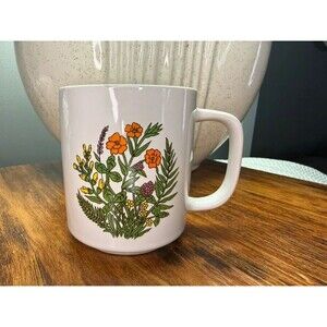 This is a vintage 1970s Meadow Wildflower Bouquet Ceramic Coffee Mug
